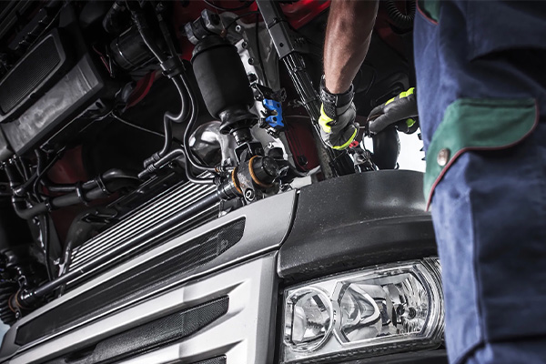 Vehicle being worked on shop